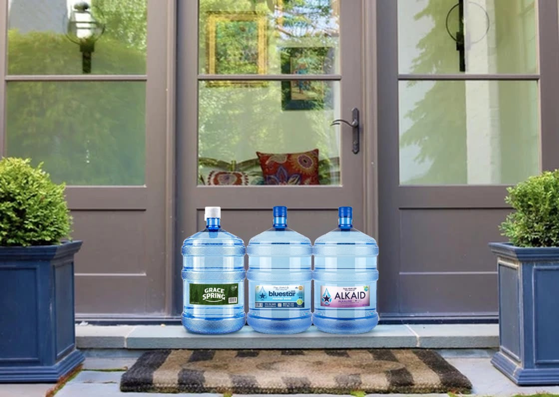 Grace Spring, Blue Star purified and ALKAID alkaline 5-gallon jugs delivered to a front door